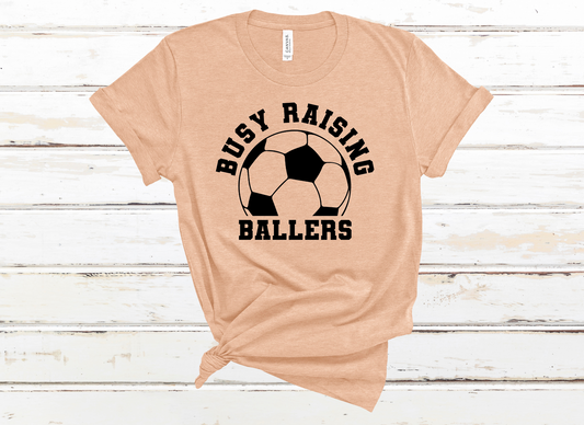 Busy Raising Ballers - Soccer Tee
