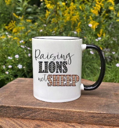 Raising Lions not Sheep Mug